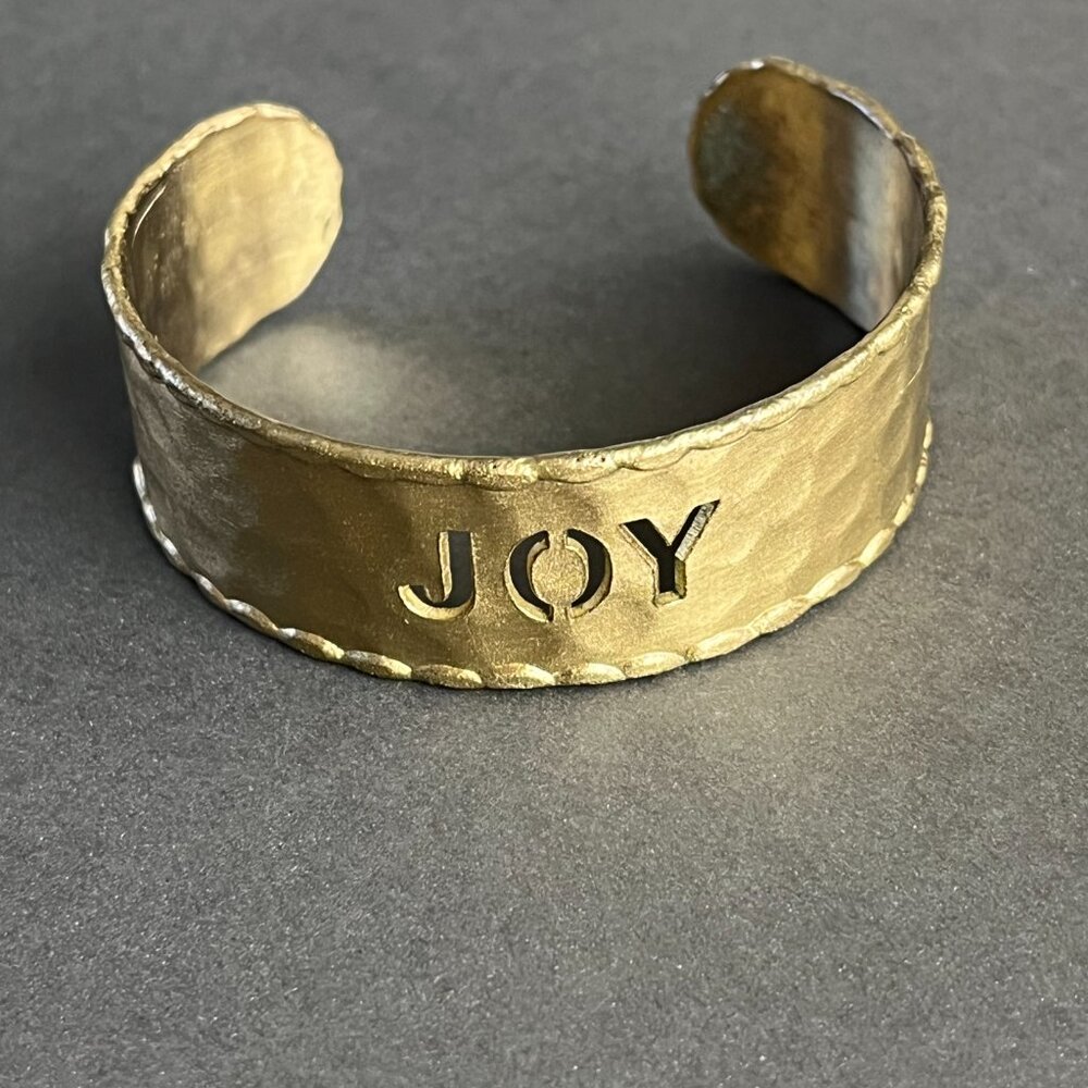 Rustic Cuff Brass "Joy" Cutout cuff bracelet aprox 1" wide adjustablet